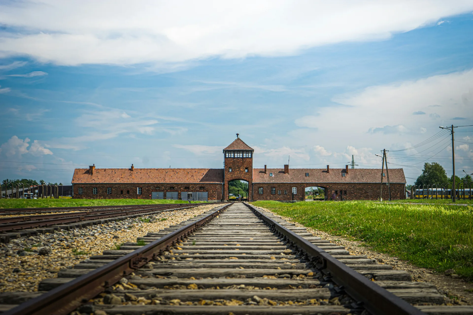 Railway tracks leading to the entrance building at Auschwitz-Birkenau