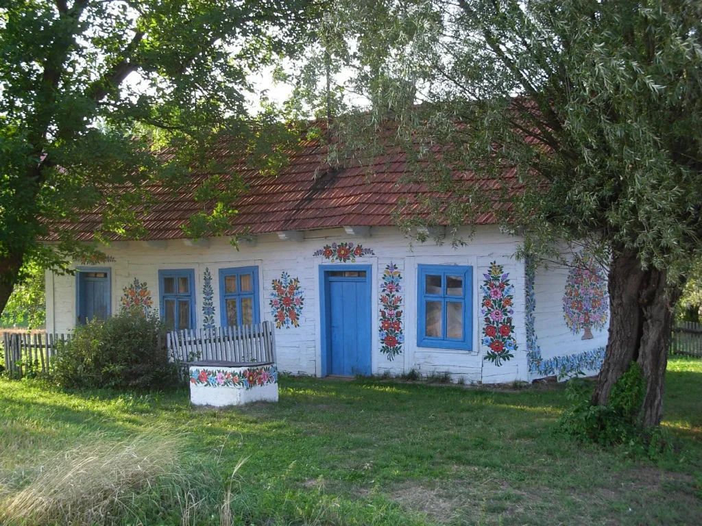 A traditional cottage decorated with floral paintings in Zalipie