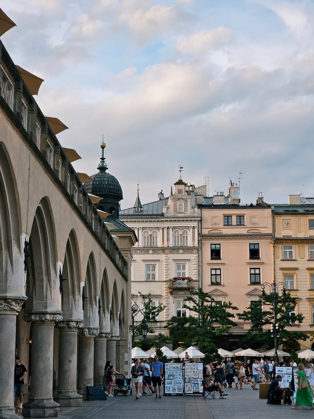 Cloth Hall arcades and historic townhouses on Krakow's Main Market Square